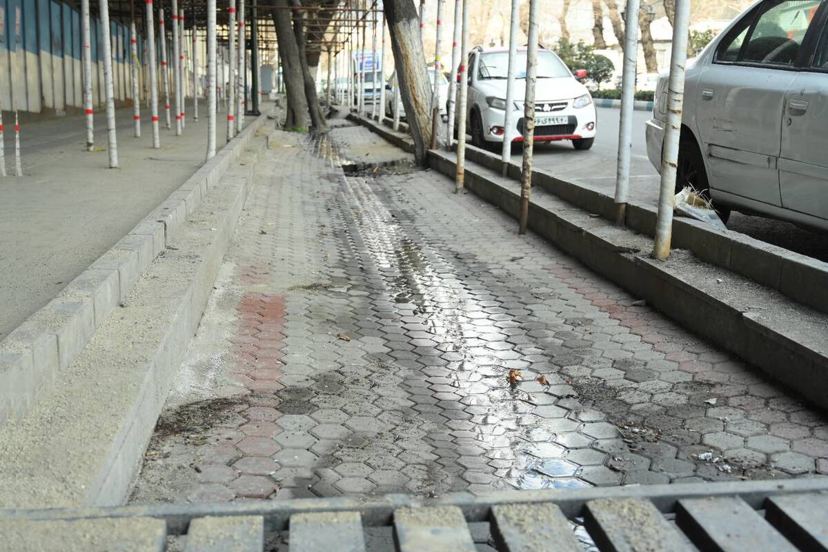  کف سازی نهر خیابان شریعتی به مساحت ۱۲۰۰ متر مربع