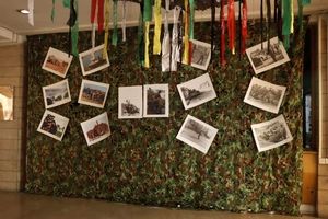 فضاسازی محیطی و برپایی نمایشگاه عکس به مناسبت هفته دفاع مقدس در منطقه ۴